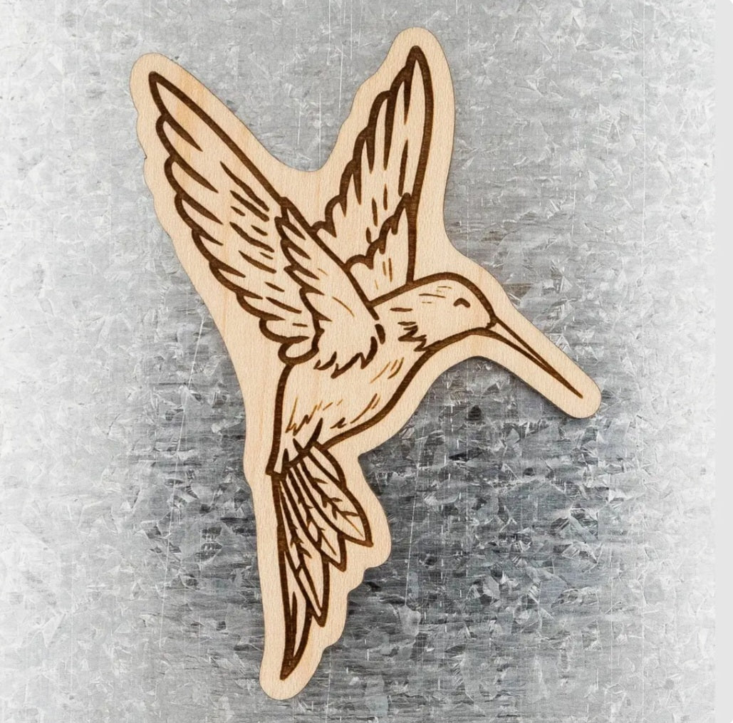 Wood hummingbird magnet with wings spread, laser-cut design