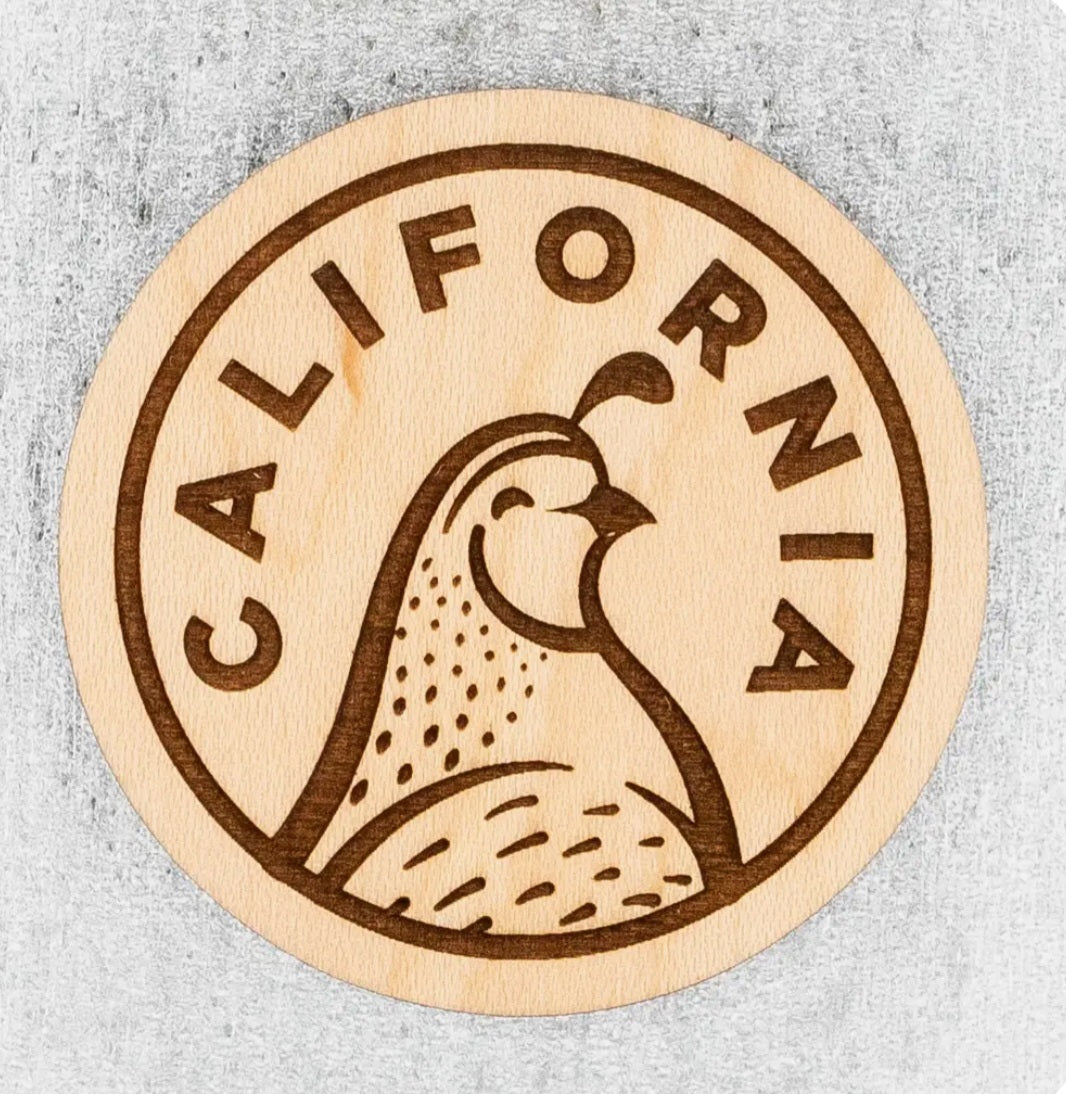 Round wood magnet with California quail illustration and circular text design