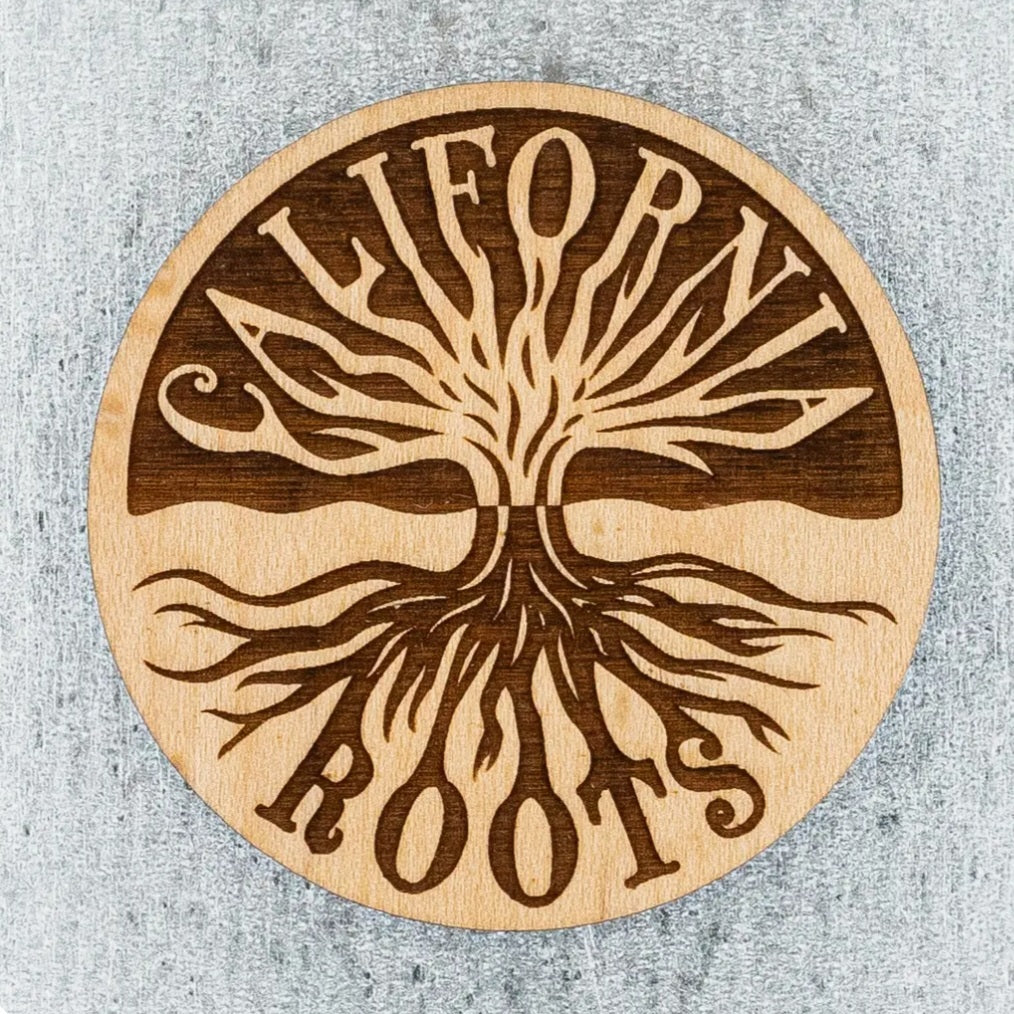 Wood round magnet with tree of life and roots design in brown