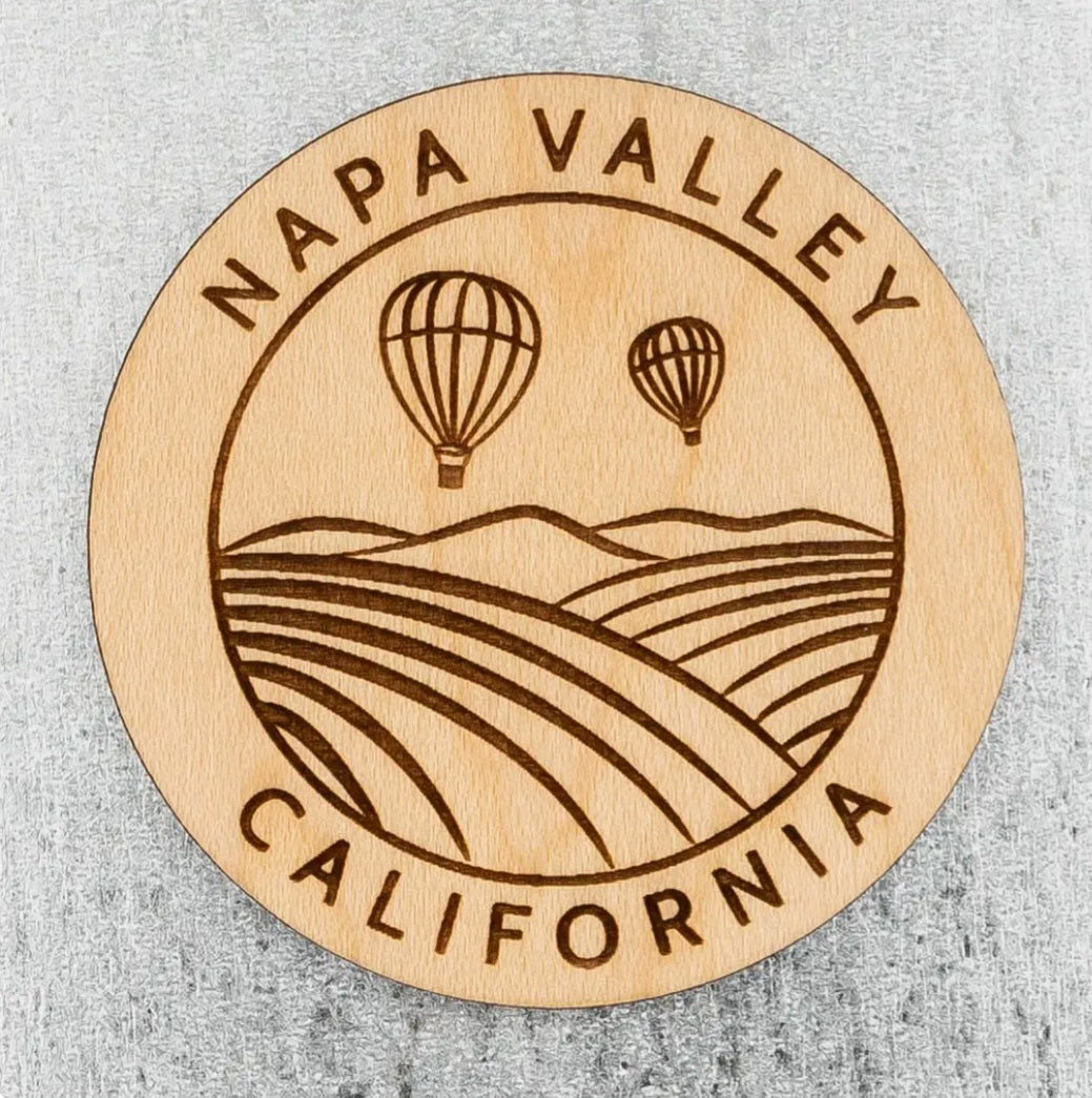 Round wood magnet with engraved Napa Valley California and hot-air balloons over hills