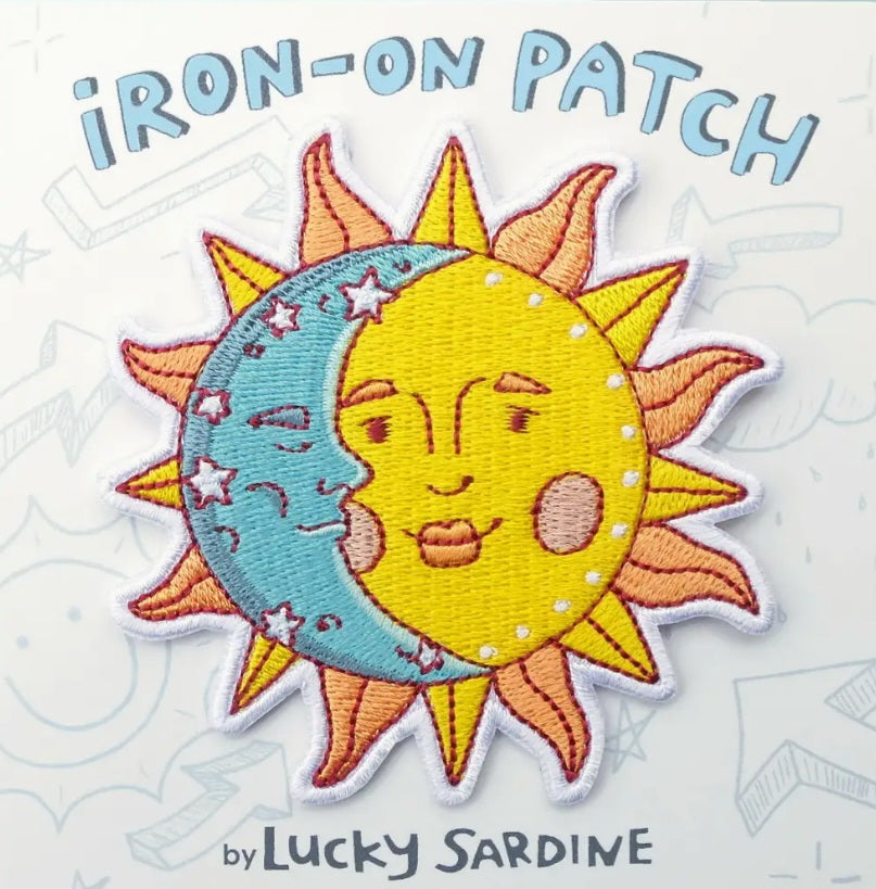 Sun and moon iron-on patch: smiling yellow sun face with blue crescent moon