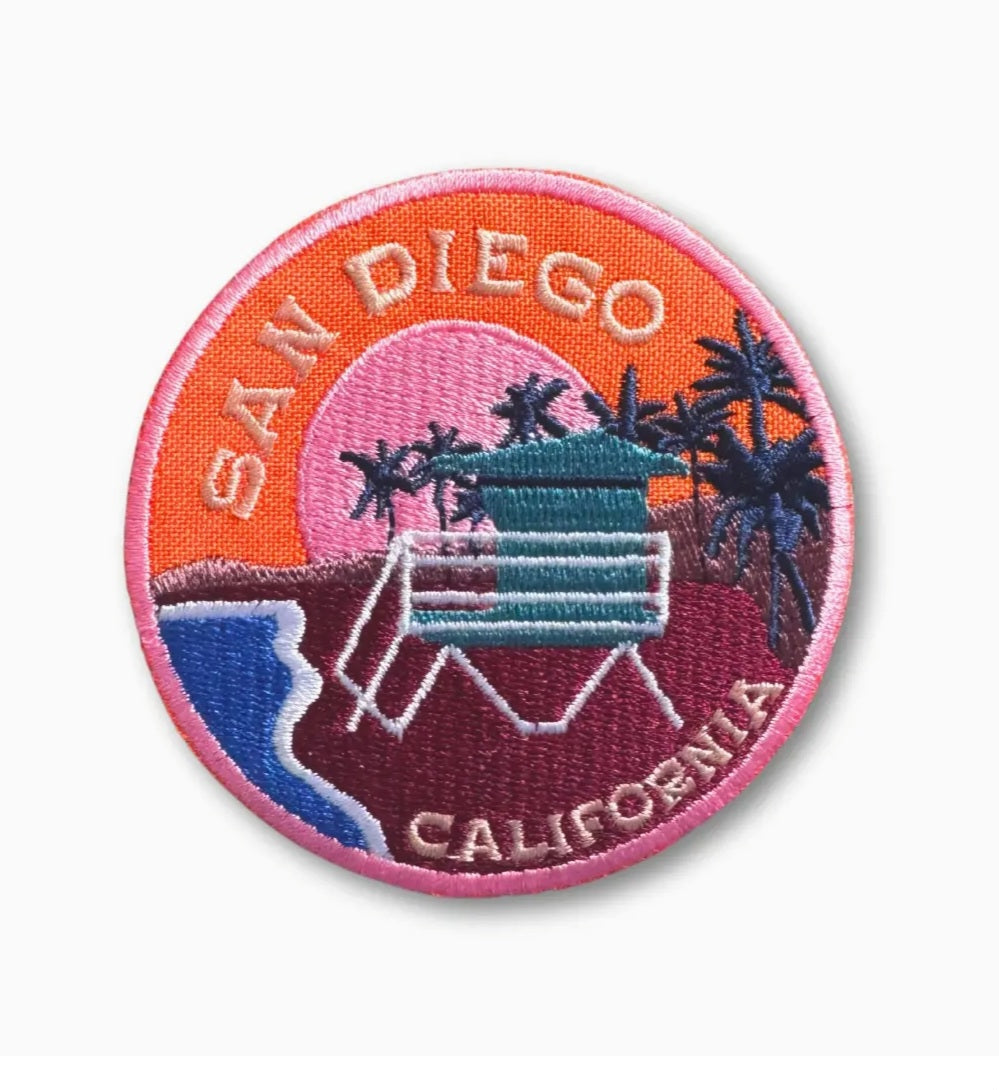 Round iron-on patch with pink border, palm trees, San Diego California text