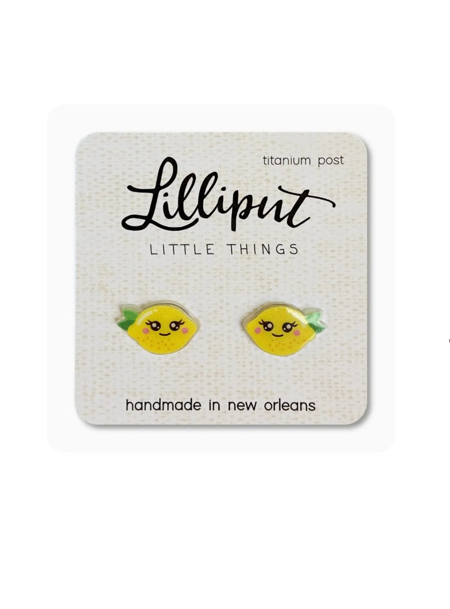 Lilliput lemon face stud earrings with green leaves; titanium post.
