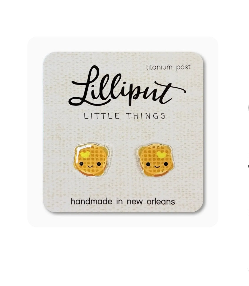 Small yellow waffle stud earrings with smile faces, titanium posts