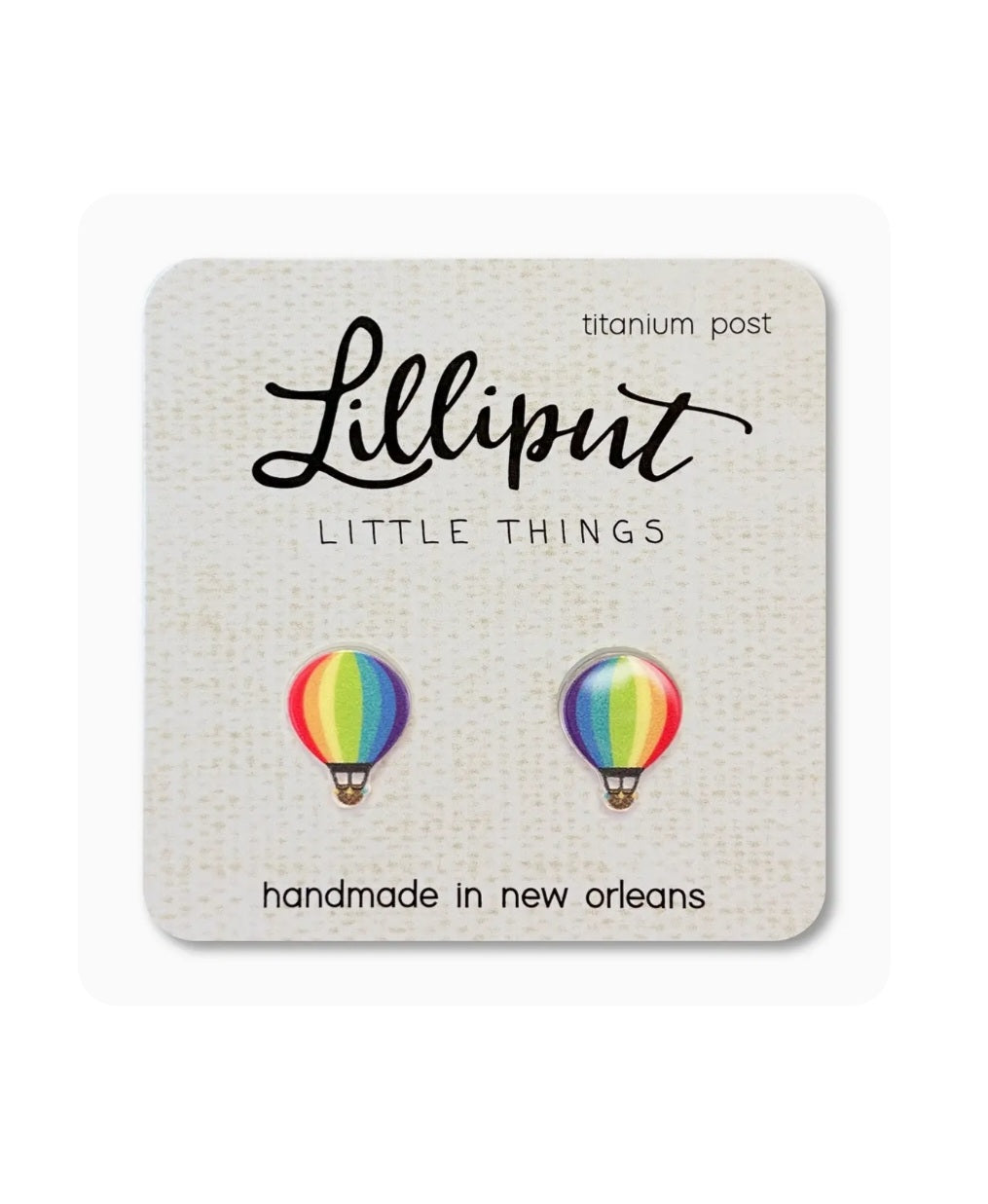 Hot air balloon stud earrings with rainbow striped balloons and titanium posts