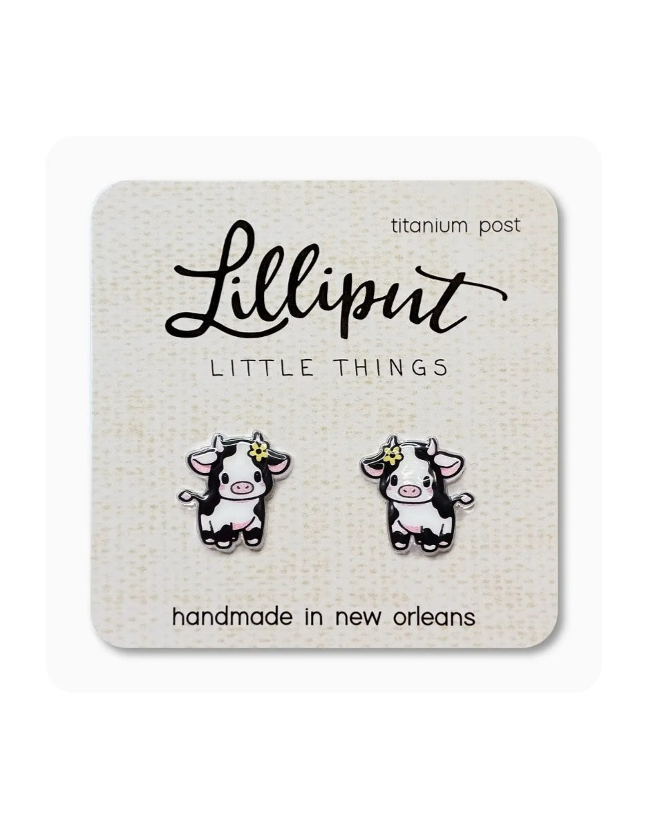 Lilliput baby cow stud earrings with titanium posts, gold star accents