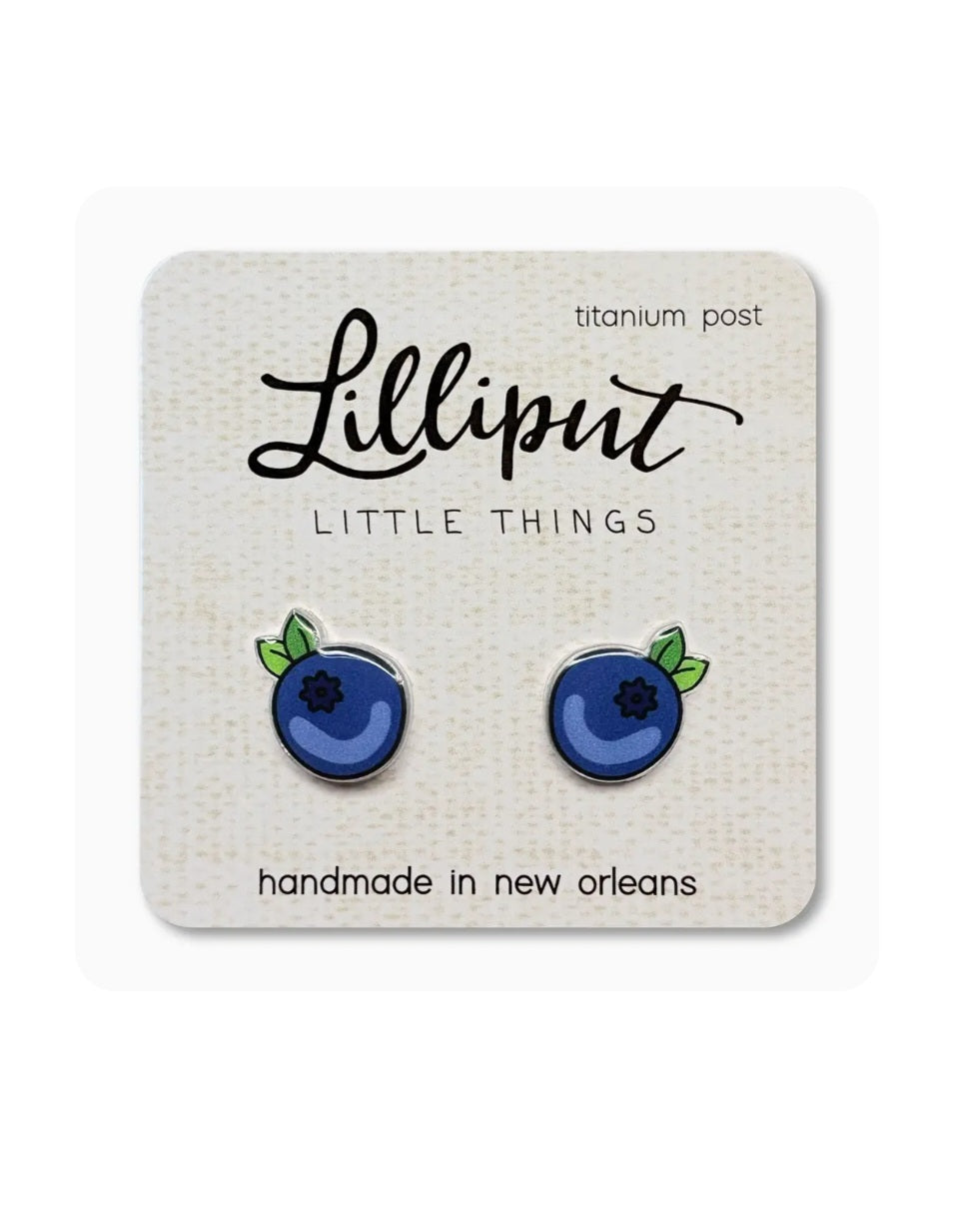 Lilliput blueberry stud earrings with blue enamel and green leaf accents, titanium posts