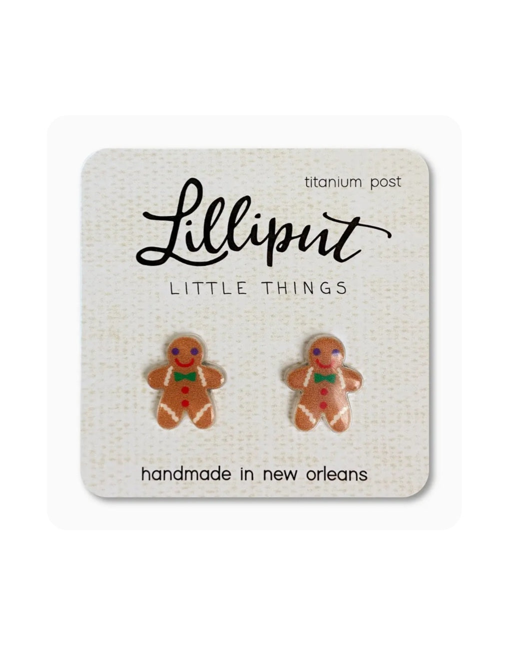 Gingerbread man stud earrings with titanium posts, red and green enamel details