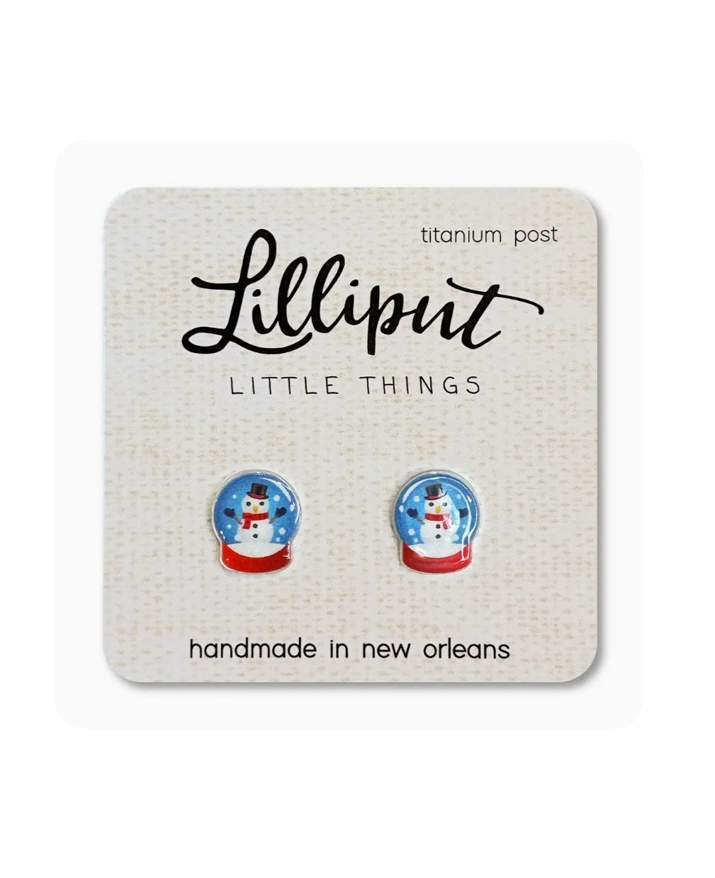 Snowman globe stud earrings with blue snowmen and red bases, titanium posts
