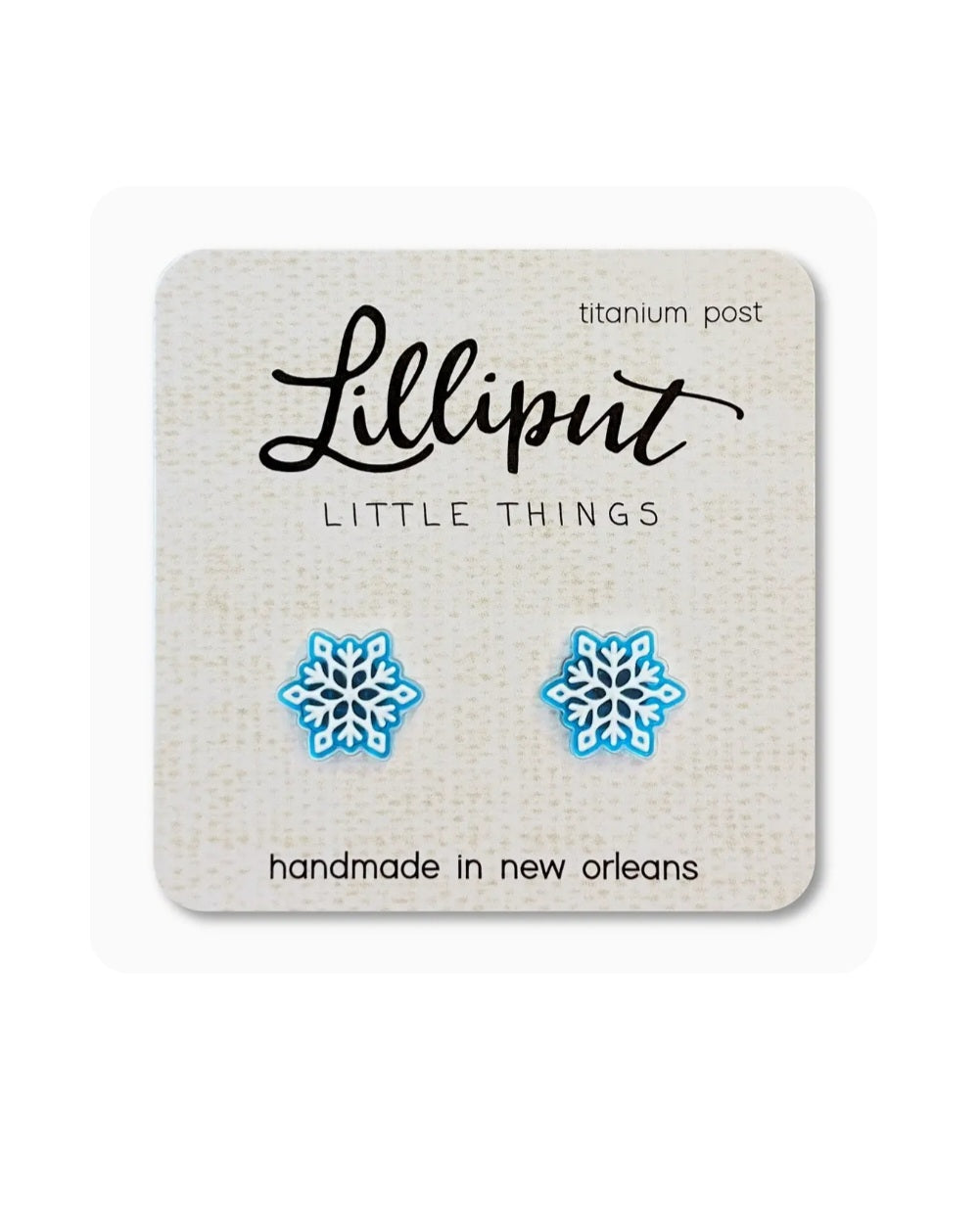 Blue snowflake stud earrings with titanium posts