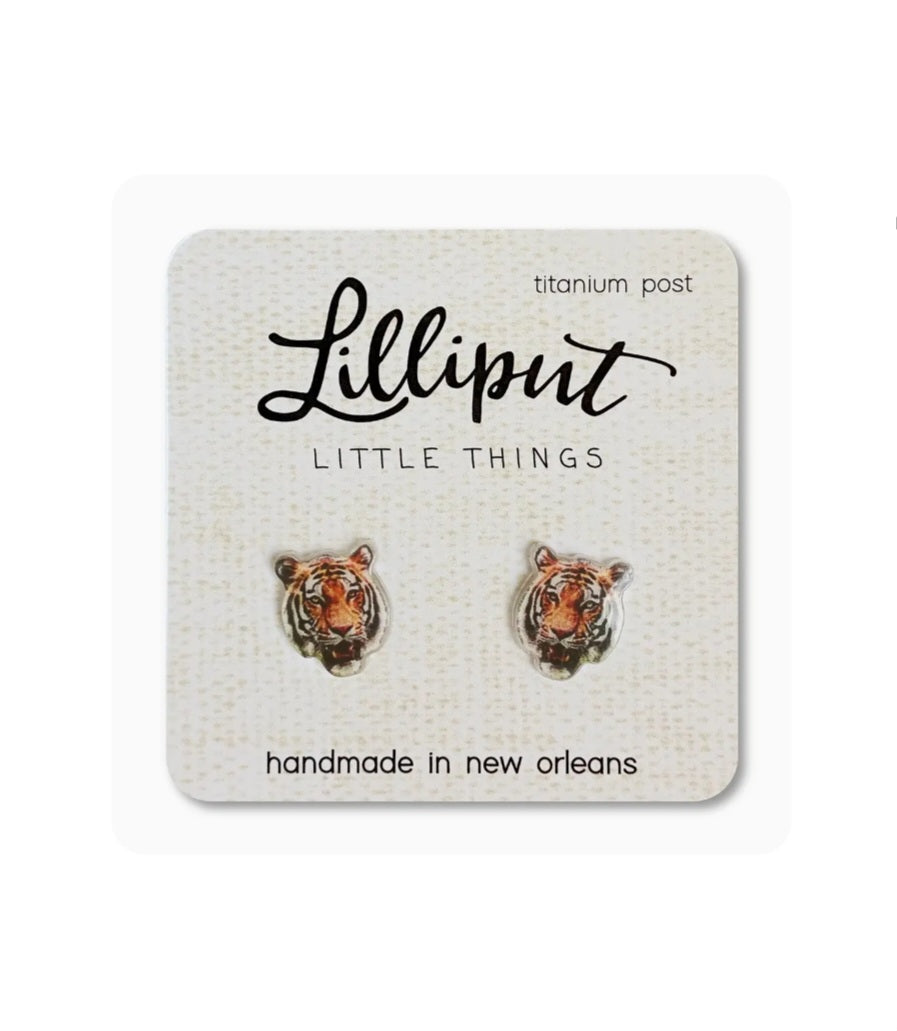 Small tiger head stud earrings with metal posts, brown and orange.
