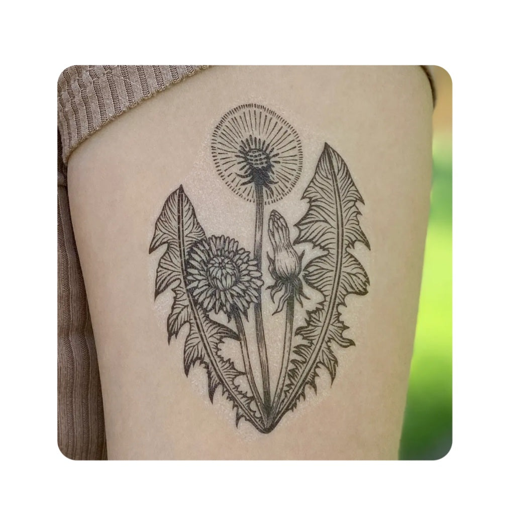 Dandelion flower temporary tattoo with rabbit and leafy floral design, black ink