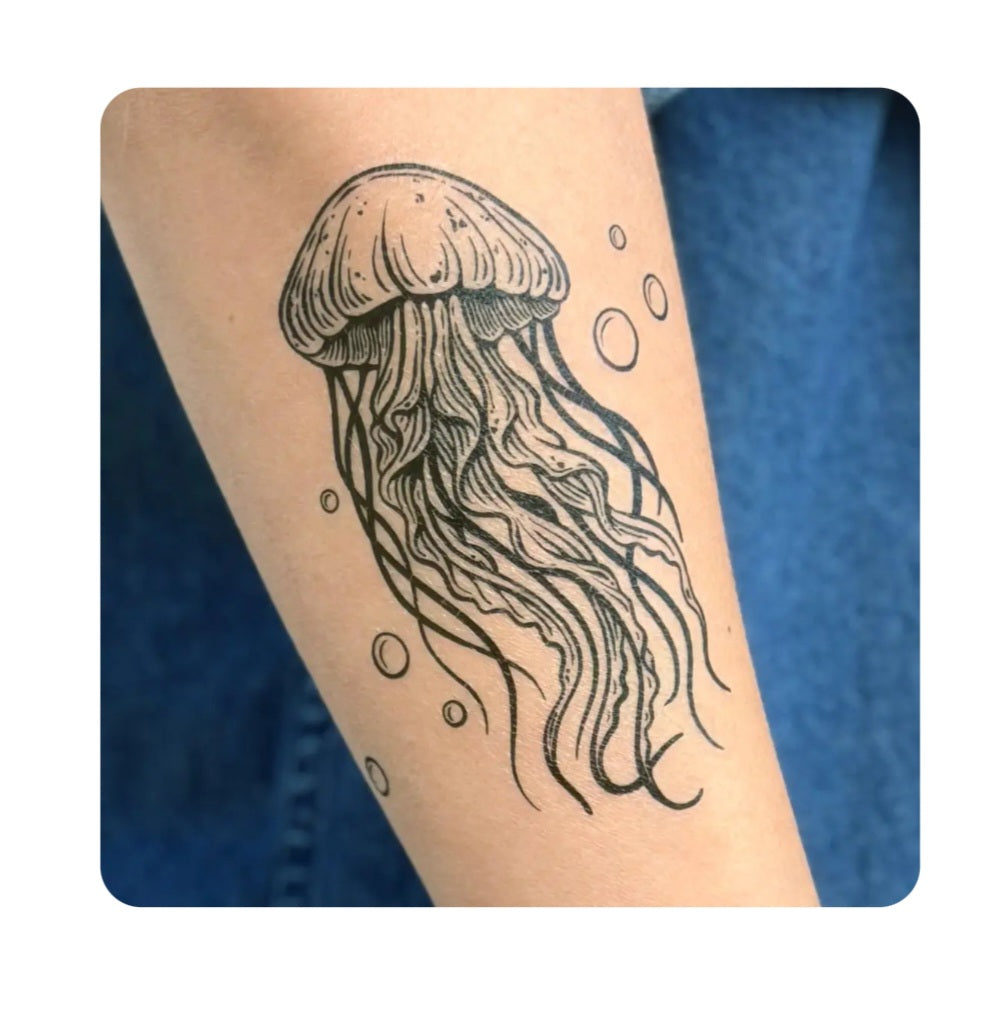 Jellyfish temporary tattoo on arm, black line jellyfish with bubbles