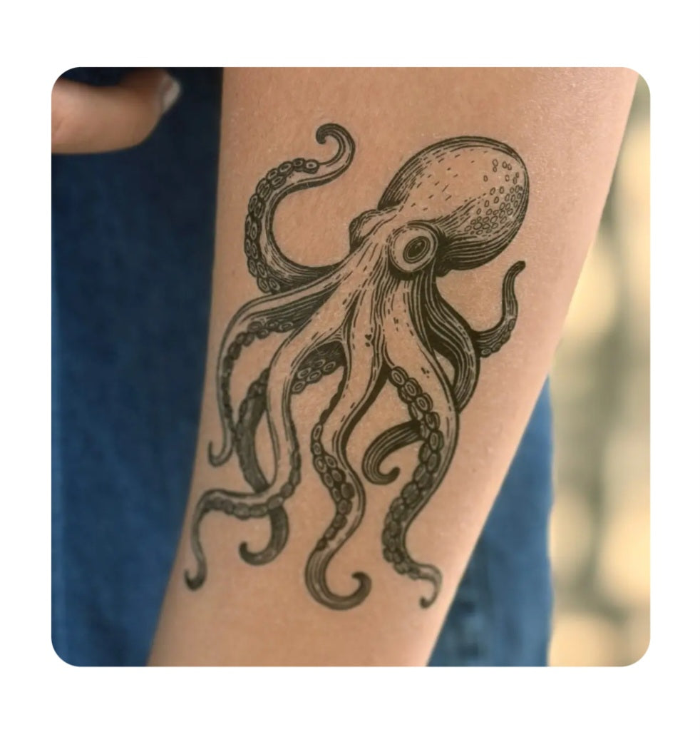 Octopus temporary tattoo on skin, black and gray detailed octopus design