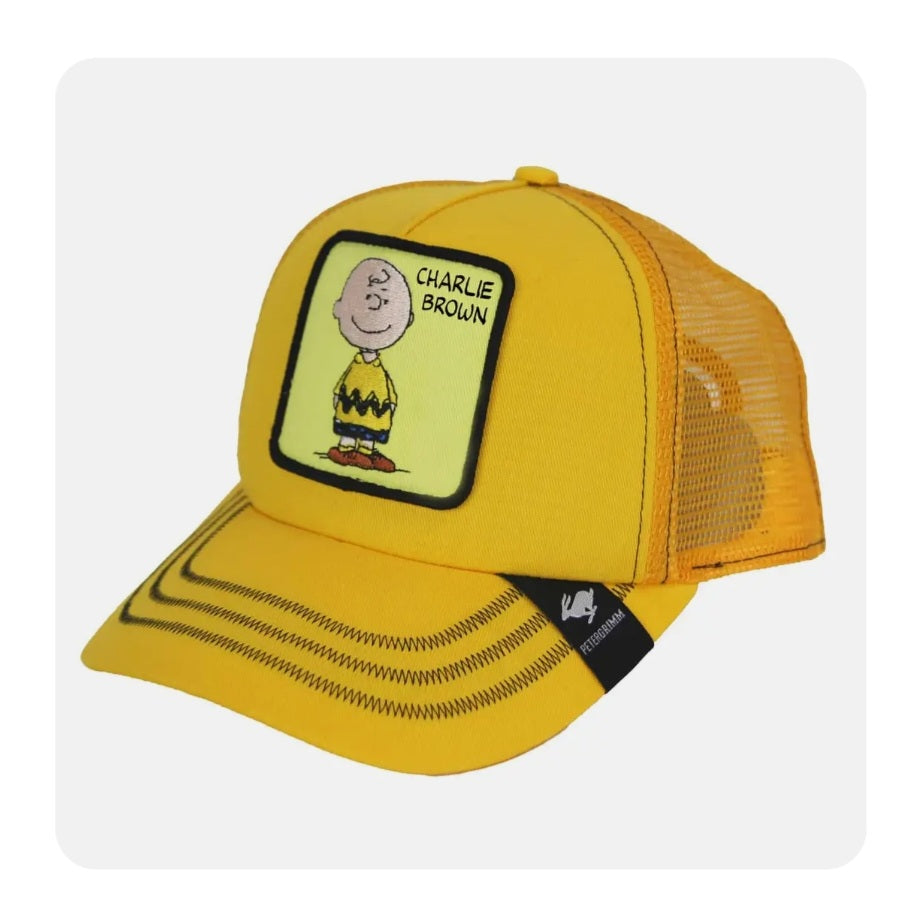 Yellow trucker hat with Charlie Brown patch and black mesh back