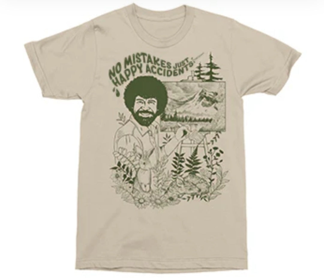 Tan T-shirt with Bob Ross face and woodland landscape front graphic